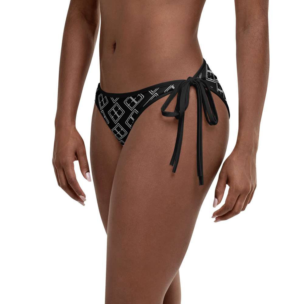 all-over-print-bikini-bottom-black-left-view-of-bikini-outside-61fda3ad53ad1.jpg
